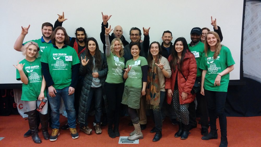 One Earth Film Festival volunteers and guests gathered after a screening